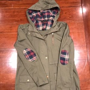 Green jacket with flannel elbow pads and hood